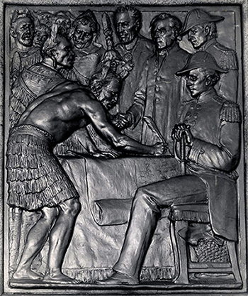 Bronze plaque of treaty signing